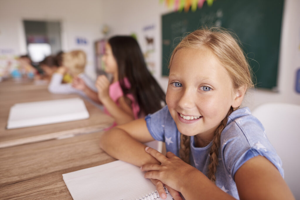 Portrait of smiling elementary school girl